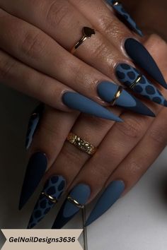 Stylish matte nails with bold designs and sleek finishes, offering a modern and sophisticated look for any occasion. French Tips Pointy Nails, Studs On Nails, Navy Leopard Print Nails, Beyonce Nails Designs, Teal New Years Nails, Teal And Burgundy Nails, Monochromatic Nail Art, Villain Era Nails, Black Leaf Nails