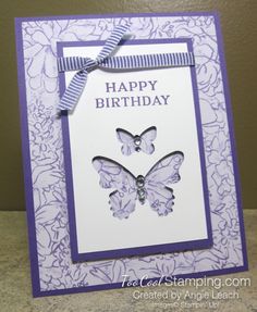 a purple and white birthday card with butterfly dies on it's front side