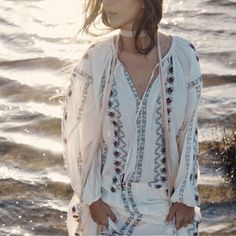 Questions? Leave A Comment Below! White Folk Style V-neck Blouse, Bohemian Long Sleeve Embroidered Top For Vacation, Off White Long Sleeve Bohemian Blouse, Long Sleeve Tops With Geometric Embroidery For Summer, Off White Embroidered Summer Tops, Summer Long Sleeve Peasant Top With Geometric Embroidery, Summer Long Sleeve Embroidered Top, Embroidered Off White Summer Tops, White Embroidered Long Sleeve Blouse