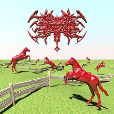 a group of red horses standing on top of a lush green field next to a wooden fence