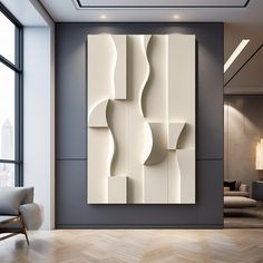 a modern living room with an abstract art piece on the wall