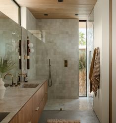 the bathroom is clean and ready to be used as a bathtub or shower stall