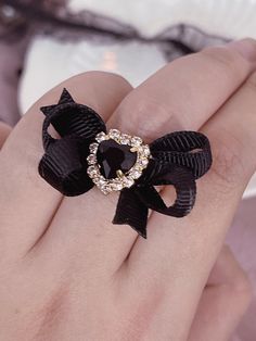 The price is for a ring only, others are not included. Adjustable Black Rings For Party, Elegant Heart Shaped Rings For Parties, Adjustable Black Party Rings, Adjustable Black Party Ring, Elegant Black Rings For Valentine's Day, Elegant Heart-shaped Rings For Party, Black Jewelry For Valentine's Day Party, Elegant Adjustable Crystal Ring For Party, Heart Shaped Bow Jewelry For Party