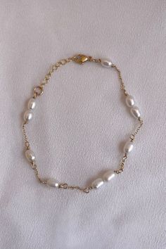 A handmade 14k Gold filled organically shaped pearl bracelet. This elegant bracelet is perfect everyday wear or special occasions and a wonderful  Gift for Mom, Wife, Friend, Sister, Grandmother and Daughter. HOW TO ORDER 1. First, select your bracelet size in the drop down box 1. Then, select your desired metal, bracelet type/set and add to cart! BRACELET MEASURING GUIDE: Average Women's Sizing: 5-6.5 inches = extra small 6.5-7 inches = small 7-8 inches = medium 8 inches+ = large *We recommend 14k Gold Filled Bracelet With Pearl Chain As Gift, 14k Gold Filled Pearl Chain Bracelet Gift, 14k Gold-filled Bracelets With Pearl Drop, Gold Bracelets With Pearl Drop In 14k Gold Filled, Handmade 14k Gold-filled Pearl Bracelet, Gold Pearl Bracelet With 14k Gold Filled Pearl Chain, Handmade Dainty Gold Pearl Bracelet, Gold 14k Gold Filled Pearl Chain Bracelet, Handmade Gold Pearl Bracelet In 14k Gold Filled