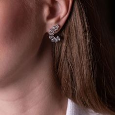 Delve into a realm of elegance with the Kite Adya Earrings, where sophistication meets innovation in a breathtaking dance of diamonds. A new twist on a timeless classic, these diamond half-hoops boast an unrivaled allure, effortlessly elevating any ensemble to celestial heights. Each earring features kite-shaped diamonds, a bespoke cut crafted exclusively for Ruchi New York's illustrious KITE collection, ensuring a look that is as rare as it is radiant.With a dazzling total weight of 2.96 carats, these earrings exude opulence and refinement, promising to captivate admirers at every turn. From boardroom meetings to glamorous soirées, these earrings are the epitome of versatility, seamlessly transitioning from day to night with unparalleled grace. Embrace the extraordinary and adorn yourself Glamorous Brilliant Cut Diamond White Earrings, Glamorous Bridal Earrings, Diamond With Brilliant Cut, Glamorous Diamond Bridal Earrings With Brilliant Cut, Glamorous Brilliant Cut Diamond Earrings, Elegant Formal Cluster Earrings With Lab Grown Diamonds, Elegant Wedding Cluster Earrings With Lab Grown Diamonds, Elegant Baguette Diamond Earrings For Anniversary, Elegant Wedding Earrings With Lab Grown Diamonds, Classic Diamond Ear Climbers For Anniversary