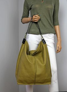 Green Leather Hobo Bag with Zipper, Everyday Large Slouchy Leather Bag, Soft Leather Hobo Bag, Everyday Handbag for Women **Dimensions Height: 18,5 inch (47 cm) Width: 18,1 inch (46 cm) Length of handle: 19,3 inch (49 cm) Bottom width: 13,4x 5,9 inch (34x15 cm) Internal pocket: 8,7x 6,7inch (22 x 17 cm) Large, very roomy bag made of thick yet soft cattle leather. The bag can be worn as a shoulder bag. Detachable shoulder strap. There is a lot of space and you can put there everything in your eve Khaki Hobo Bag With Large Capacity And Double Handle, Khaki Double Handle Hobo Bag For Everyday Use, Large Capacity Khaki Hobo Bag With Double Handle, Olive Rectangular Bag With Large Capacity, Khaki Hobo Bag With Removable Pouch, Olive Tote Shoulder Bag, Khaki Hobo Shoulder Bag For Everyday Use, Olive Large Capacity Shoulder Bag For Travel, Large Capacity Olive Shoulder Bag For Travel