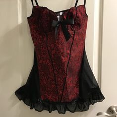 Sexy Red Brocade Bustier With Bows And Ruffles. Size L. Never Worn. Made In China From Polyester Material. Elastic Mesh Back. Pit To Pit 14.5 Unstretched Waist 13.5 Unstretched Hip 17 Unstretched Length Underarm To Hem Ruffle 19 Red Party Corset With Built-in Bra, Red Corset With Built-in Bra For Night Out, Red Sleeveless Corset With Boning, Red Underwire Party Corset, Red Underwire Corset For Party, Red Corset With Built-in Bra, Party Corset With Built-in Bra In Red, Red Sleeveless Corset With Built-in Bra, Fitted Coquette Bra For Night Out