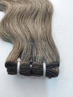 Grey - Salt and pepper Clip-in Hair Extensions HAT HAIR Extensions - Manufactures and Suppliers of Raw unprocessed Indian human hair. Human Hair is sourced from Temples all over India. Pure Single donor hair cuticle aligned from HAT HAIR EXTENSIONS factory. 100% raw unprocessed Grey - Salt and pepper human hair sourced from temples in India. Single Donor, Cuticle aligned. Double Weft to ensure no Shedding. Silicon clips to ensure flexibility and rust-free. (last long for more wash) Easy to insta Grey Hair Extensions, Black And Grey Hair, Hair Cuticle, Black Hair Extensions, Indian Human Hair, Hat Hair, Clip In Extensions, Hair Crush, Gray Hair