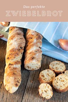 some bread is sitting on a wooden table