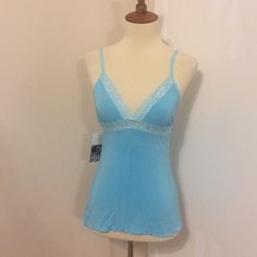 This Is A Brand New Love Tanjane Sleep Top. Pretty Blue Color With Lace Trim. Made Of A Soft And Stretchy Material. Strap Length Is Adjustable. Measures 14 Inches Across The Bust And Is About 22.5 Inches In Length. Price Is Firm. Thanks For Looking. Blue Stretch Camisole For Loungewear, Stretch Blue Camisole For Loungewear, Blue Stretch Top For Sleep, Blue Camisole For Night, Fitted Light Blue Sleepwear For Night, Fitted Cami Top For Bedtime, Blue Camisole Top For Night, Blue Camisole For Bedtime, Blue Spaghetti Straps Sleepwear