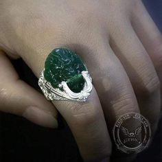 Our ring is made of jade and silver as raw materials, hand-carved. The front of the ring is a jade lion. The lion is a symbol of protecting people's peace and auspiciousness. It can not only ward off evil but also bring auspiciousness. The side of the ring is auspicious cloud carved in sterling silver, which also repre Carved Jade Ring Jewelry, Carved Jade Rings As A Gift, Carved Jade Rings For A Gift, Silver Carved Jade Jewelry, Carved Silver Jade Jewelry, Silver Jade Emerald Wedding Ring, Cloud Ring, A Symbol, Craft Time