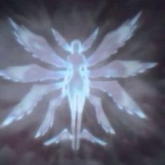 an abstract image of a woman with wings on her body in the middle of a dark background