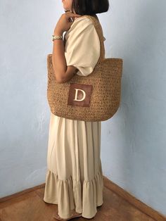 ✔️I made this beautiful bag from camel natural paper rope which is organic cotton. ✔️The interior of the straw summer bag has a magnetic button. Suitable for use as shoulder bag, beach bag or party bag ✔️There is a small vegan leather pocket on the front of the bag. ✔️I can add your initials on the leather pocket. You can personalize the letter. ✔️You can combine your clothes with a straw summer bag on summer days ✔️Handcrrafted in Turkey ✔️Hand-crocheted with care ✔️This bag is light weight yet durable, breathable and environmental at the same time. ✔️The bag hasn't  lining. But the bag has cotton lining option. ✔️This bag has a packable form and does not take up space in the suitcase. Unique for holidays ! ✔️Due to differences in shooting light and monitors, there may be color difference Casual Beach Bag With Leather Handles And Natural Fiber, Casual Beach Bag With Leather Handles In Natural Fiber, Casual Natural Straw Bag With Leather Handles, Casual Crochet Paper Straw Travel Bag, Brown Crochet Bag For Everyday Beach Season, Casual Brown Beach Bag In Natural Fiber, Everyday Brown Crochet Bag For Beach Season, Casual Everyday Crochet Bag, Casual Neutral Straw Bag With Leather Handles