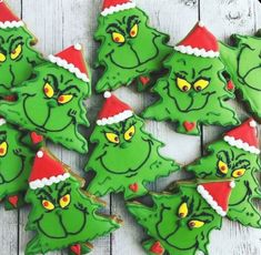 christmas cookies decorated with green and red icing