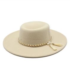 Style: Wide Brim Fedora Hats for Women Item Types: Hats for women, wool fedora hat women's, womens fedora summer hats, womens fedora hat wide brim Gender: Unisex Detail: Imitation pearl tassel band Feature: Fashion accessory, sun protection Material: Cotton Material: Polyester Material: Wool Elegant Beige Winter Fedora, Elegant Solid Color Sun Hat With Flat Brim, Elegant Fedora For Beach And Fall Season, Elegant Fedora For Beach In Fall, Elegant Felt Hat For Beach In Fall, Elegant Cream Felt Hat For Summer, Elegant Wide Brim Panama Hat For Fall, Elegant Fall Beach Felt Hat, Elegant Brimmed Panama Hat For Winter