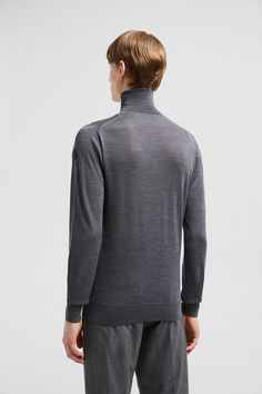 Emblematic of the collection's refined minimalism, this turtleneck sweater is crafted from supremely soft extra-fine wool. The ultra lightweight knit layers perfectly over both workwear and casual styles. Merino Wool High Neck Turtleneck For Workwear, Wool Turtleneck For Workwear, Wool Turtleneck For Work, Luxury Wool Sweater For Layering, Merino Wool Turtleneck Polo Sweater For Work, Merino Wool Turtleneck With Ribbed Cuffs For Work, Luxury Merino Wool Tops For Fall, Modern Funnel Neck Turtleneck For Work, Merino Wool Fine Knit Turtleneck For Layering