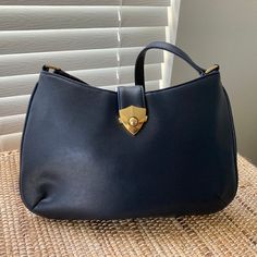 This Bag Is Vintage But Looks Brand New. Super Clean, No Flaws Dark Navy Blue With Gold Hardware With A Lock Closure One Strap With A 10" Drop Interior Has A Middle Zipper Compartment And Side Zipper Compartment 12" X 8" Classic Bag For Many Different Occasions Smoke & Pet Free Home Elegant Hobo Shoulder Bag With Snap Closure, Elegant Hobo Bag With Snap Closure, Elegant Rectangular Hobo Bag With Snap Closure, Blue Everyday Bags With Snap Closure, Elegant Hobo Bag With Snap Closure For Shopping, Blue Hobo Bag With Removable Pouch For Evening, Evening Blue Hobo Bag With Removable Pouch, Blue Evening Hobo Bag With Removable Pouch, Evening Shoulder Bag With Double Handle And Snap Closure