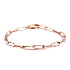 On trend and easy to wear, this paperclip bracelet is a must have item.  Layer it up or wear it on it's own.  14 kt gold and 7 inches long.  Can be made shorter or longer. email service@adiamor.com for more information. Modern 14k Rose Gold Chain Bracelet, Modern Rose Gold 14k Chain Bracelet, Modern Rose Gold Chain Bracelet With Rectangular Links, Luxury Paperclip Chain Bracelet, Formal Gold Chain Paperclip Bracelet With Rectangular Links, Luxury Paperclip Bracelet With Oval Link For Everyday, Rose Gold Chain Bracelet With Rectangular Links, Rose Gold Oval Link Paperclip Bracelet, Modern Link Paperclip Bracelet With Hooks