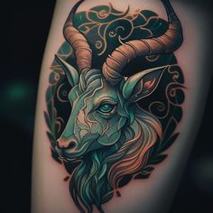 an animal tattoo on the side of a woman's leg, with long horns