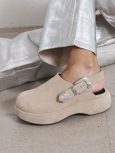 Editor's NotesPractical and stylish shoes that you'll never want to take off- Round toe- Platform slingback shoes- Western style buckles- Handcrafted outsoleMeasurements (in.)- Size: KR 225MM ( IT 35.5 ) - KR 255MM (IT 38.5 )-- Heel 1.8 in. (Front 0.8 in.   Back 1.8 in.)- Fits true to the sizeComposition & Care- Upper: cow leather- Lining: Synthetic leather- Outsole: Rubber / EVA- Insole:  Synthetic leather- Do not expose to moisture or direct sunlight for longDesigner- by TWV Leather Slip-on Clogs With Removable Insole, Calf Leather Slip-on Clogs With Removable Insole, Synthetic Slip-on Clogs With Reinforced Heel, Suede Slip-on Clogs With Buckle Closure, Slingback Shoes, Men Shoes Size, Stylish Shoes, Mens Bottom, Cow Leather