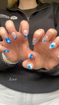 Blue star nails, acrylic, almond Short Almond Nails Designs Blue, Summer Nail Ideas 2024 Almond, Nail Ideas Acrylic Stars, Pretty Nails For Short Nails, Cute Regular Nail Polish Nails, Light Blue Sparkly Nail Designs, Cute Bright Nail Designs, Preppy Acrylic Nail Ideas, Preppy Nails Simple