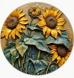 sunflowers are painted on the side of a round wall hanging ornament