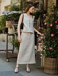 FINAL SALEChic linen fitted maxi skirt with high back vent . Styled with matching linen vest. 100% linenFully lined 100% polyesterSide pockets Size XS waist 25"/36"Size S waist 27"/37.5"Size M waist 29"/38.5"Length 36.5"Model is wearing a size small and model's height is 5.9"/175cm Linen Office Wear, Vest And Skirt Outfit, Linen Top And Skirt, Vest With Skirt, Skirt And Vest, Fitted Maxi Skirt, Casual Maxi Dresses, Linen Style Fashion, Linen Maxi Skirt