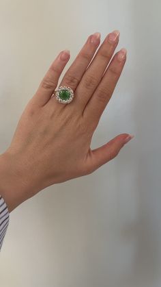 Ring crafted in 18k yellow gold with a stunning 3.59ct Oval E/W Tsavorite center with 2.03ct white round brilliant Diamond halo.  This ring is a size 7. This piece was handmade in Los Angeles. It is ready for immediate shipping. Tsavorite Ring, Custom Signet Ring, Bezel Ring, Ring Crafts, Diamond Halo, Brilliant Diamond, Bracelets And Charms, Signet Ring, Charm Earrings