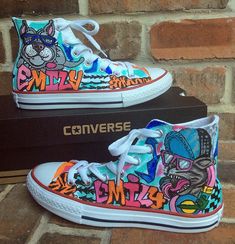 Custom Painted Chuck Taylor Hi Tops for Girls with Graffiti Style artwork on them featuring a pitbull in a Spiked collar and sunglasses and a tom cat in a baseball cap, glasses and headphones. Super hip and great for a hip hop routine. Name will be painted in a graffiti style lettering. This clients daughter was doing a competition dance routine to the song Slam It by The Puppies, So, that is also featured on the shoes. I can paint any theme you would like tho, and this is just a sample for cust Shoes Graffiti, Graffiti Shoes, Lifting Shoes, Custom Converse, All Stars Converse, Vans High Top Sneaker