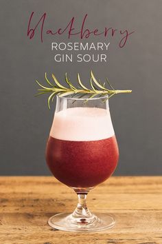 a drink in a glass with rosemary garnish on the rim and text that reads meddleerry rosemary gin sour