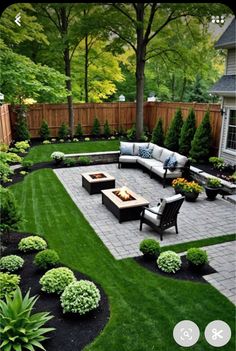 an outdoor patio with couches and tables in the middle of it, surrounded by green grass