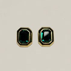 The Vintage Green Rectangle Earrings feature stunning faceted emerald green glass rhinestones and a high polish gold tone metal. Circa 1980s. Note, one rhinestone has a tiny chip. Measure 1" Only one pair available. Ready to ship. Cheap Green Rectangular Earrings, Rectangle Earrings, Hotel Style, Vintage Costume Jewelry, Style Guide, Vintage Costumes, Gold Tone Metal, Green Glass, Vintage Earrings