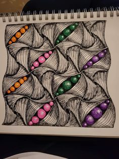 a drawing with colored balls in it