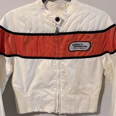 Cream Vintage Moto-Style Racing Jacket From Harley Davidson. Brand New Without Tags, Never Worn. Size Small In Women’s. All Orders Ship Asap! White Sporty Biker Jacket With Long Sleeves, White Sporty Long Sleeve Biker Jacket, White Long Sleeve Sporty Biker Jacket, Retro White Biker Jacket For Winter, Retro White Biker Jacket For Fall, White Moto Outerwear With Long Sleeves, White Long Sleeve Moto Outerwear, Casual White Motorcycle Outerwear, Fall Motorcycling White Outerwear