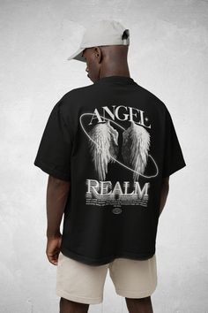 Introducing our Angel Wings Oversized T-Shirt, the unisex street style clothing for both men and women. This unique tee boasts an oversized fit, delivering a relaxed and effortlessly cool aesthetic. The striking angel wings design adds a touch of urban, making it a versatile statement piece for any wardrobe. Crafted with attention to detail and comfort, this shirt embodies the perfect fusion of style and ease, ensuring you stand out while staying comfortable in your streetwear fashion endeavors. 🌱 SAVING THE TREES WITH EACH PURCHASE 🌱 With every purchase you make, we pledge to plant a tree. Your support not only benefits the environment but also transforms lives. Join us in planting trees and making a positive impact. We appreciate your contribution! ✨ Quality ✨ Our clothing boasts 100% Angel Wings Shirt Design, Oversized T Shirt Design, Statement Shirt Design, Angel Tshirt, Street Style Clothing, Angel Wings Design, Cool Aesthetic, Streetwear Mode, Streetwear Aesthetic