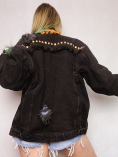 Upcycled black denim jacket with handmade rips. This classic, vintage black denim trucker jacket was decorated with round gold studs and rips. Additionally, there are two types and colors of fringes - black and gold. There is only one piece of such jacket and this makes it one of a kind and eye-catching. If you want to stand out, this jacket is perfect for you. Also, you will rock in it on special events like music festivals or concerts; even photoshoots! Durable 100% cotton denim assures you th Fall Festival Denim Jacket With Fringe, Fall Festival Fringe Denim Jacket, Festival Long Sleeve Outerwear With Frayed Hem, Fringe Denim Jacket For Fall Festival, Edgy Denim Jacket For Winter, Edgy Winter Denim Jacket For Alternative Fashion, Edgy Winter Denim Jacket, Vintage Black Distressed Denim Jacket, Black Distressed Vintage Denim Jacket