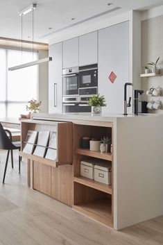 the kitchen is clean and ready to be used as a dining room or office space