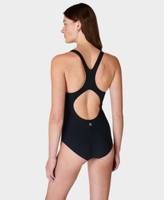 Our new racerback swimsuit designed for lifestyle and lane swimming . Part-recycled fabric is resistant to damage from chlorine and UV50+ rays . Smoothing, sculpting fit with medium-rise leg  . Inner bra support with removable pads . Front length: 76cm / 30” . Model wears size S and is 178cm/5'10" tall. Style Code: SB9626Colour: Black Elastane Swimwear With Built-in Cups, Sporty Tankini With Built-in Padding For Swimming, Nylon Racerback Swimwear With Built-in Padding, Nylon Tankini With Built-in Padding For Swimming, Functional Racerback Swimwear For Swimming, Sporty Moisture-wicking Tankini For Swimming, Functional Compression Swimwear For Sports, Functional Racerback Swimwear For Beach, Racerback Tankini For Swimming