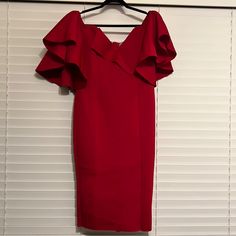 Great For The Holidays Red Short Sleeve Midi Dress For Cocktail, Red Ruffled Sheath Dress, Red Sheath Dress With Ruffles, Red Sheath Dinner Dress, Red Sheath Dress For Dinner, Red Ruffled Midi Dress For Formal Occasions, Elegant Sleeveless Midi Dress For Holiday, Red Midi Dress For Spring Dinner, Chic Midi-length Dress For Holiday