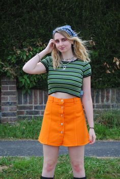 ♥Super cute 90s vintage bright orange denim mini skirt with button up closure! ♥Brand: Miss Cool ♥In brand new deadstock vintage condition (even has the original tags!) ♥Available in UK size 10 and 12. (Labels say size 12 and 14 but as they are vintage the sizing comes up a size smaller, please refer to measurements below). ♥Size 10 - Waist measurement: 28 inches, Hip measurement: 36 inches, Length measurement: 16.5 inches ♥Size 12 - Waist measurement: 31 inches, Hip measurement: 38 inches, Leng Orange Retro Mini Skirt, Retro Cotton Mini Skort, Orange Fitted Retro Mini Skirt, Orange Cotton Mini Skirt For Spring, Fitted Retro Orange Mini Skirt, Spring Orange Cotton Mini Skirt, Orange Cotton Mini Skirt, Retro Orange Mini Skirt, Orange Casual Mini Skort