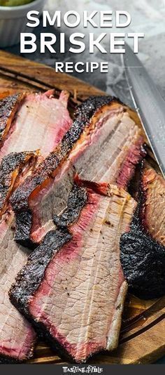 sliced brisket on a cutting board with knifes