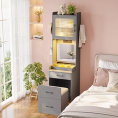 a bedroom with pink walls and white furniture