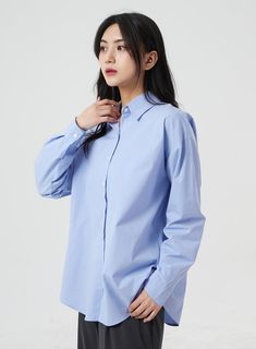 Product Detail Introducing Pastel Color Oversized Shirt BM304, a modern take on women's workwear inspired by KPOP and Korean fashion. Available in white, pink, yellow, mint, and light blue, this solid-print shirt features a loose fit for a comfortable and stylish look. Made in Korea. Style : Modern Occasion : Work wear Print : Solid Material : Cotton Sleeve : Long sleeve Neck : Collar Length : Long Fit : Loose fit Cotton 100 Color : White, Pink, Yellow, Mint, Light blue Model Size Height : 167cm Modern Oversized Shirt For Office, Oversized Light Blue Shirt For Work, Oversized Blue Blouse For Work, Modern Blue Blouse For Office, Oversized Light Blue Collared Shirt, Oversized Blue Shirt For Work, Light Blue Shirt For Office In Spring, Oversized Collared Light Blue Top, Light Blue Office Shirt For Spring