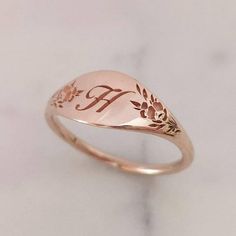 Elegant and unique 14k gold monogram signet ring, Vintage style floral initial ring, personalized engraved signet ring. * Band width: 1.5 mm, wide part width: 7 mm* Thickness: 1.5 mm* Available in 14K or 18K YELLOW, WHITE and ROSE gold.   The price listed is for 14K please contact me for 18K pricing.* Sizes vary from 5 US to 9 US, including half sizes.    Please choose your size upon checkout.* Please choose a the letter you would like to be engraved and mention in note to seller.* Please choose Elegant Rose Gold Engraved Ring Stamped 14k, Engraved Initials Promise Ring In Rose Gold, Elegant 14k Gold Engraved Initials Ring, Luxury Rose Gold Signet Ring For Wedding, Luxury Rose Gold Wedding Signet Ring, Luxury Rose Gold Engraved Ring Stamped 14k, Luxury Engraved Rose Gold Signet Ring, Rose Gold Engraved Wedding Ring With Hallmarks, Anniversary Rose Gold Engraved Ring