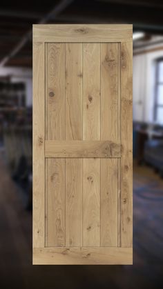 an open wooden door in the middle of a room