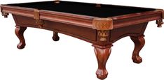 a pool table with black cloth and wooden trimmings on the legs, in front of a white background