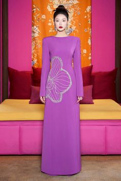 Experience the ultimate luxury in our Ao Dai. Crafted with the finest materials, this elegant dress flows effortlessly for a timeless and sophisticated look. The boat neck adds a touch of exclusivity while the velvet and satin fabrics provide a soft and opulent feel. Make a statement in style with this. Length: 150cm (Ao Dai), 110cm (Pants) Beaded Clothes, Beads Clothes, Satin Fabrics, Mean Blvd, Hijabi Outfits, Satin Maxi, Satin Maxi Dress, Elegant Dress, Soft Velvet