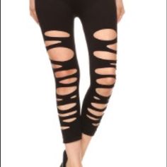 Very Hip Cutout Capri Leggings Casual Black Capris For Fall, Black Cropped Leg Capris For Spring, Black Stretch Capris For Fall, Black Capri Length Leggings For Spring, Casual Leggings For Night Out In Spring, Black Fitted Capris For Spring, Fitted Black Capris For Spring, Fall Black Stretch Capris, Stretch Edgy Leggings For Spring