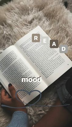 someone is reading a book with the words read and mood spelled on it in front of them