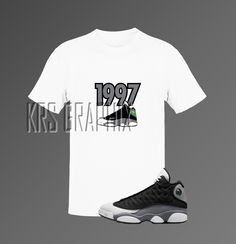 Sneakerheads, get ready to rock the freshest style with our Jordan 13 Black Flint inspired t-shirt! 🔥 Made from a soft and lightweight combed and ring-spun cotton blend, this t-shirt is comfortable and flattering for both men and women. With '1997 Jordans' graphics inspired by the iconic Jordan 13 Black Flint colorway, this t-shirt is a must-have for any true sneakerhead. This t-shirt features a pre-shrunk fabric, shoulder-to-shoulder taping, and side-seamed construction for durability. The fabric weight is 4.2 oz (142 g/m2) and comes in a variety of colors. Please note that the Jordan 13 Black Flint shown in the images is not included and any shoes displayed in our listings are sold separately and are only used for marketing purposes. When it comes to care, this t-shirt should be washed Throwback Graphic Print T-shirt For Streetwear, Throwback Streetwear T-shirt, Pre-shrunk, Throwback Logo Print T-shirt For Streetwear, Throwback T-shirt With Logo Print For Streetwear, Throwback Streetwear T-shirt With Logo Print, Jordan T Shirts Men, Jordan 13 Black Flint, Jordan Tshirt, Jordan 13 Black